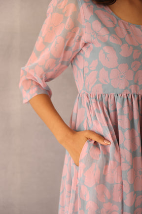 Grey and pink floral maxi dress with pockets.