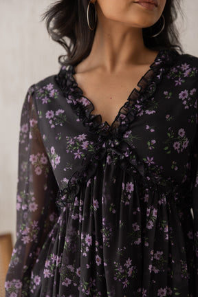 Black and lavender chiffon maxi dress with floral design.