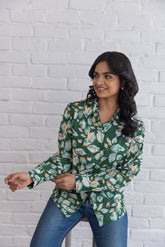 Stylish green cotton shirt top with floral print for women.