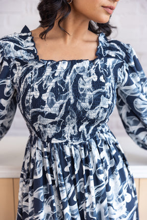 Smocked cotton nursing maxi dress for stylish breastfeeding.