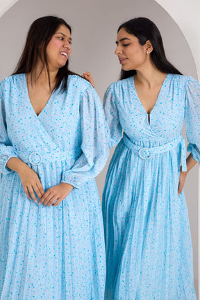 Sky blue pleated maxi dress by Polago Plus, stylish and elegant design.