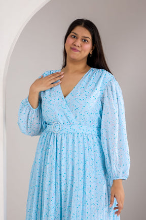 Sky blue pleated maxi dress with a flattering V-neck design.
