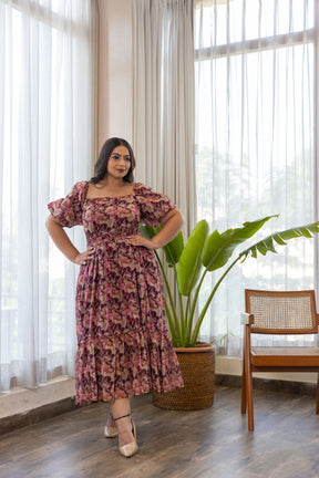 Wine belted floral maxi dress on model, stylish and elegant design.