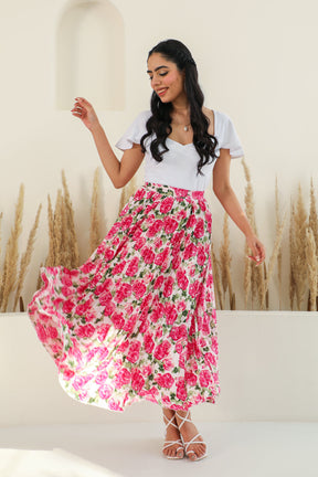 Elegant floral pleated co-ord outfit for stylish summer occasions.
