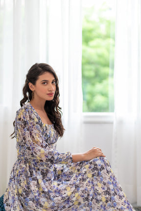 Smocked co-ord set with floral print, styled in natural light.