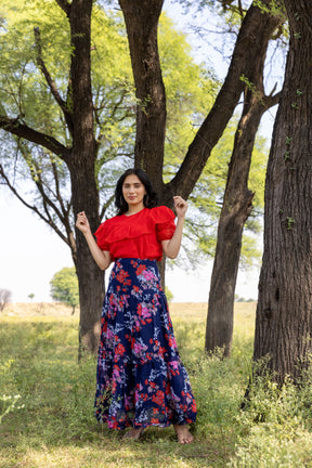 Stylish red and blue co-ord set with floral skirt and ruffled top.