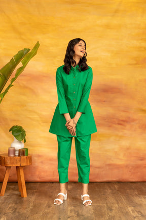 Model wearing vibrant green Shamrock co-ord set against a colorful background.